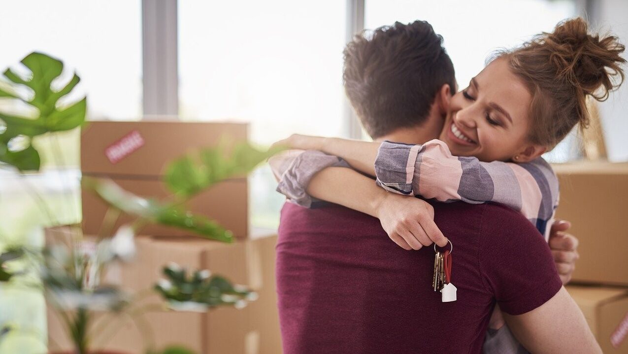 Couple with new house keys