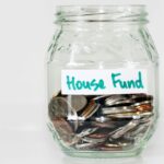 House fund coins in a jar